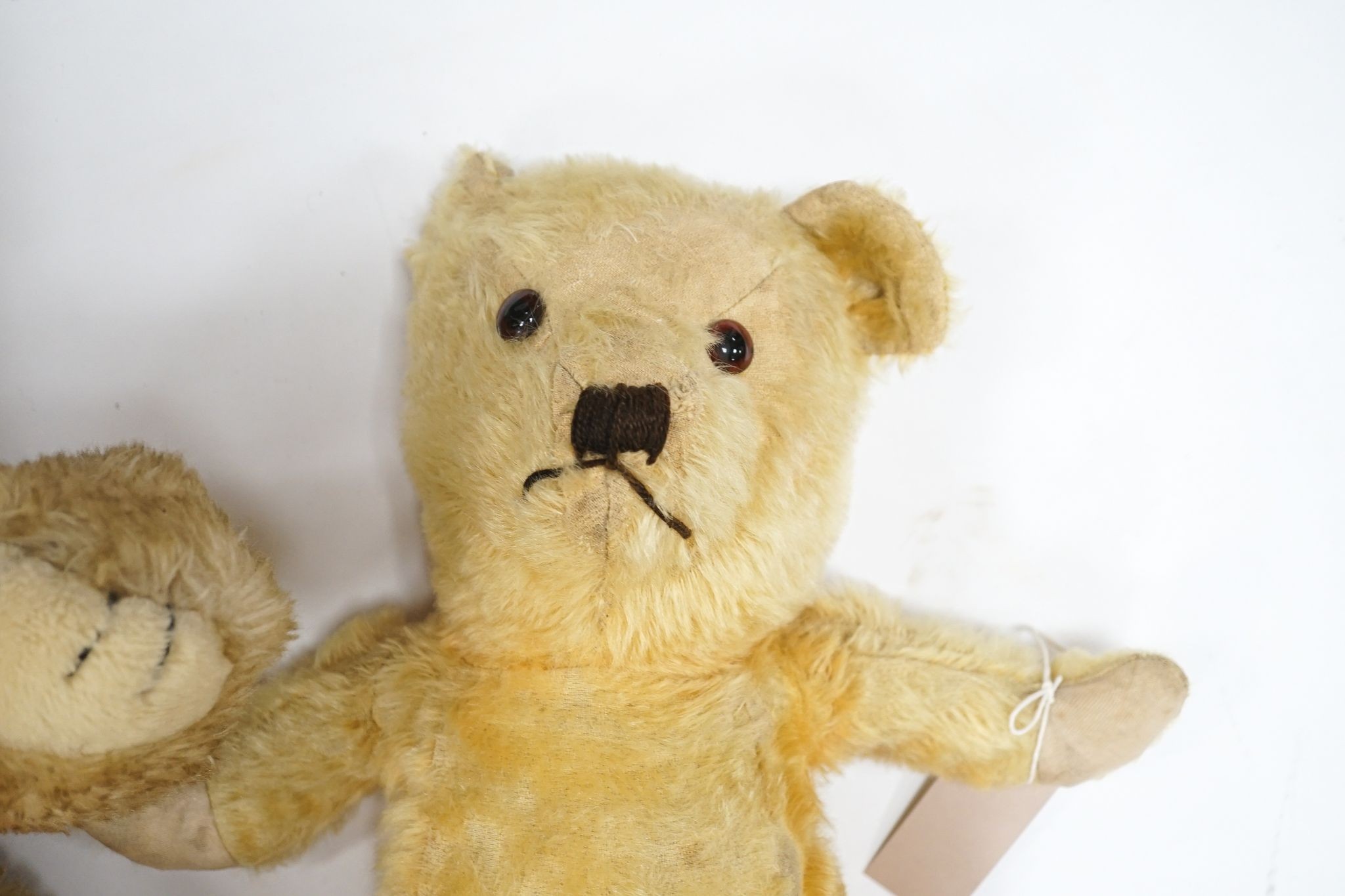 Wendy Boston, 24in. with label, good condition, together with a Deans with label, 18in., good condition and an unjointed 1950's English bear, 19in.